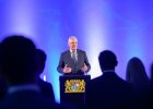Innenminister Joachim Herrmann am Rednerpult anlässlich seiner Rede beim Staatsempfang der Bayerischen Staatsregierung zum „Weltmarktführer Innovation Day“ in Erlangen