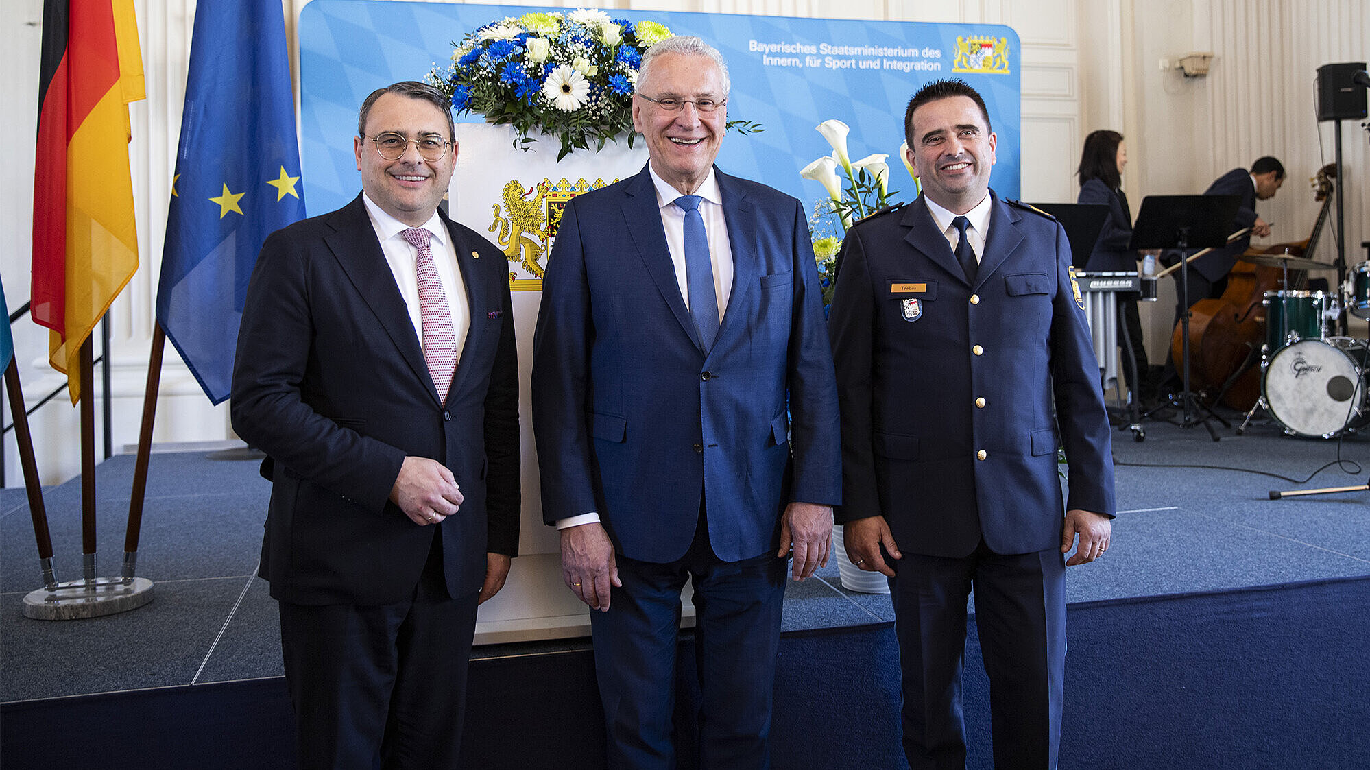 Radmacher, Herrmann und Trebes vor feierlicher Bühne